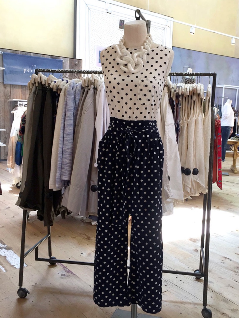 WHIT Two Navy and White Polka Dot Sleeveless Jumpsuit with Waist Tie